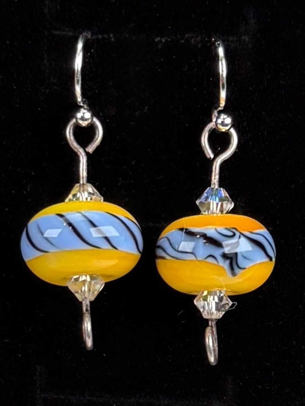 Silvertone, yellow and blue swirl pierced earrings